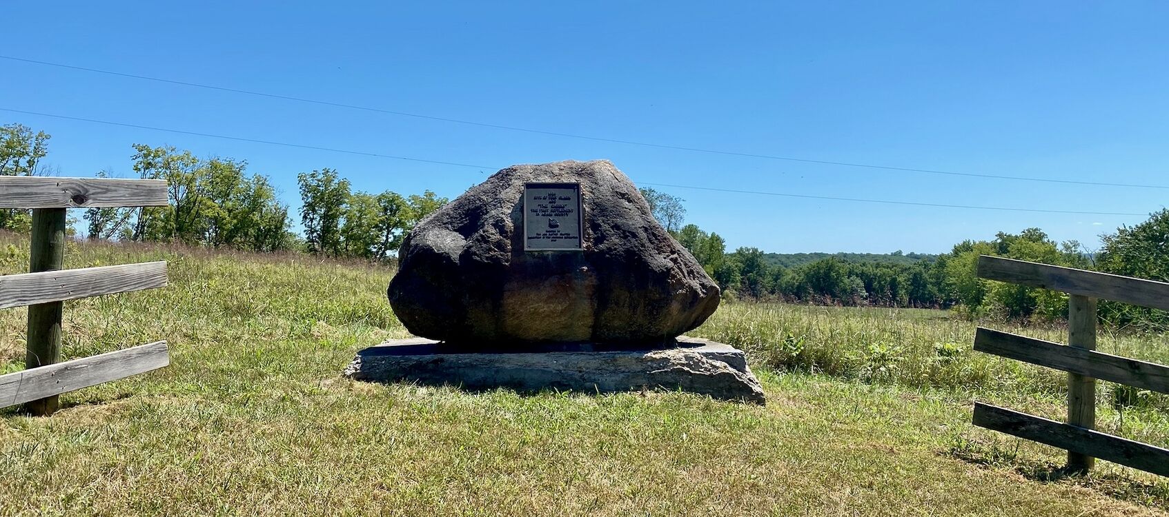 The Actual Site of Fort Clark marked by a large boulder with a Plaque.