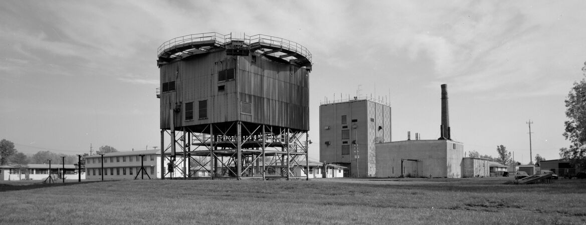 Selfridge AFB Radar Site after Closure, FPS-26 Tower in Center, FPS-35 Tower in the Back, Heating Plant on the Right.
