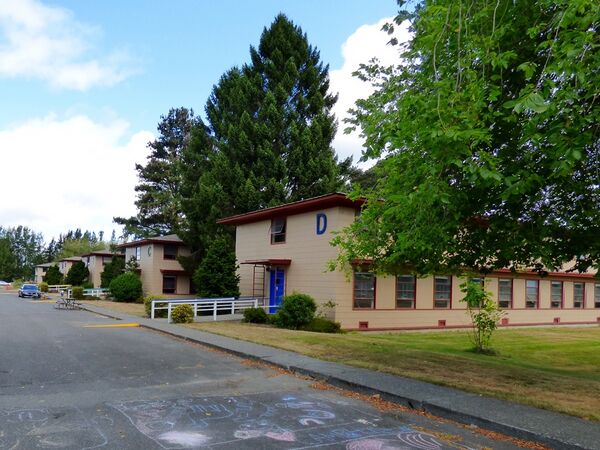 Former Blaine AFS BAQ buildings (first four buildings) and Recreation building (last building).